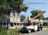 Tim Corbin's Tree Service trucks on the job